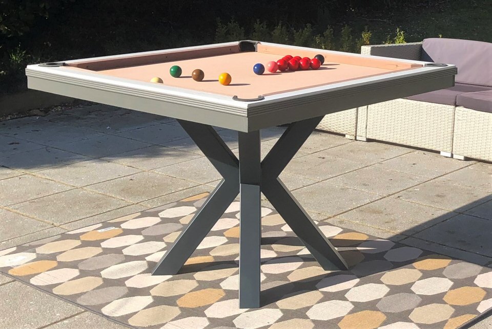   a 4ft square pool table with balls in play